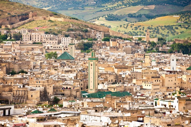 FEZ, MOROCCO: There's a camel head - the head of an actual, formerly alive camel - hanging from a hook in the market, ...