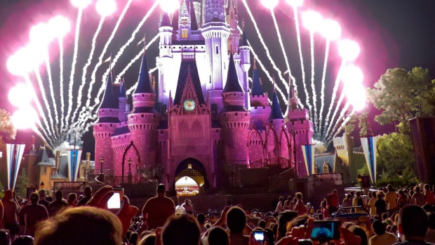 Fireworks explode over Cinderella's Castle in Magic Kingdom, Disney World, Florida.