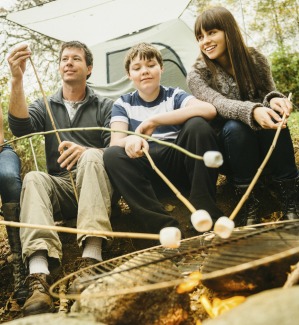 Cooking around the camp fire is a good way to relax.