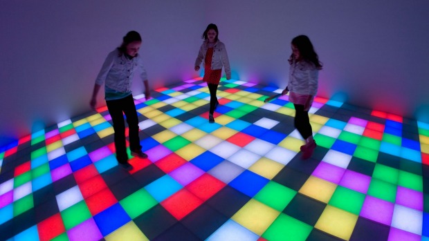 Three youngsters play the in Guggenheim Museum and Art Gallery in New York - when they should perhaps have been at school.