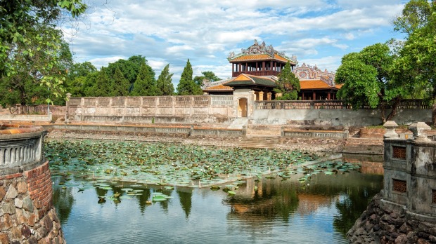Moat of the Imperial Citadel of Hue, one of the many imposing palaces in the city.