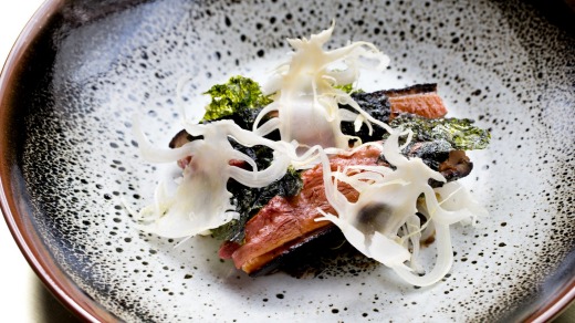 Bennelong at the Opera House: Roasted Hombre duck hispi cabbage, black miso, seaweed.