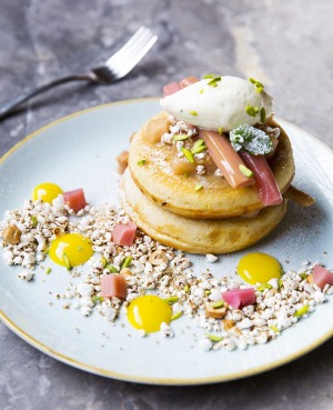 Pancakes with poached rhubarb, puffed grains, toasted hazelnuts and creme fraiche from St Ali in Yarra Place, South ...