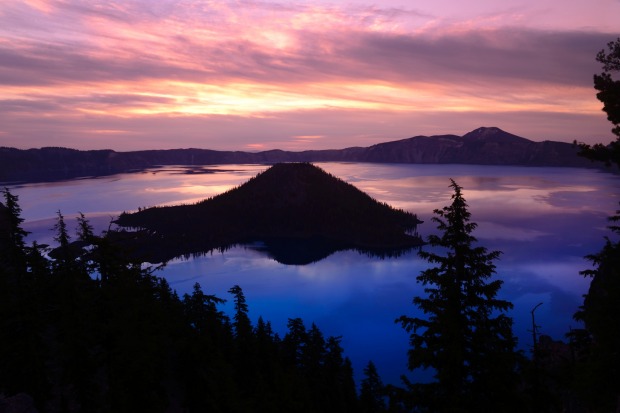 View over Wizard Island at sunrise, Crater Lake National Park.