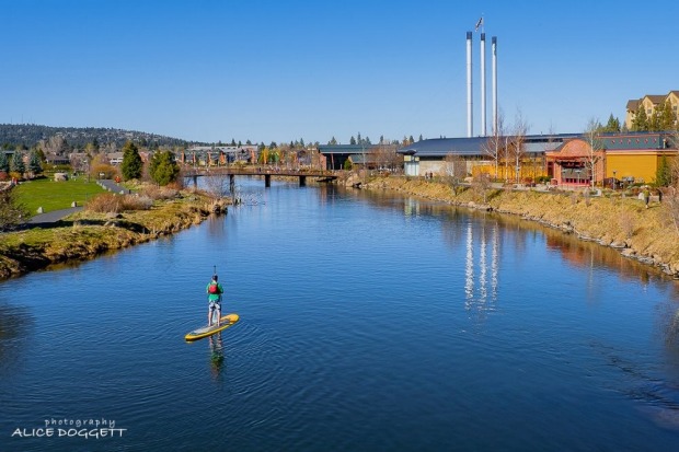 SUP along the Deschutes River in Bend, Oregon.