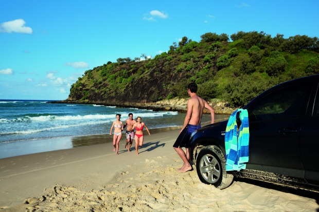 Relaxing on the beach along the Great Beach Drive.