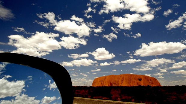 A great view from the road: World Heritage-listed Uluru in Australia's Northern Territory.