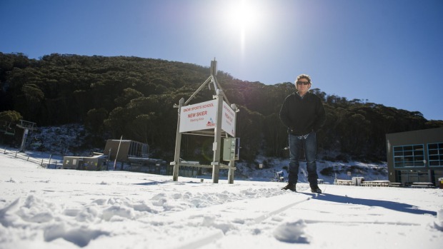 Shop owner in Thredbo and Jindabyne, Reggae Elliss welcomes the snow.