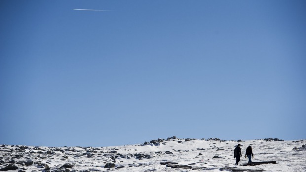 Noni Plews and Marion Murri walking the Kosciuszko track ahead of the snow season opening at Thredbo.