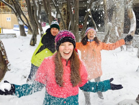 Mt Buller residents Ben Annear, Kate Monahan and Katie Bowker enjoy the fresh snow.