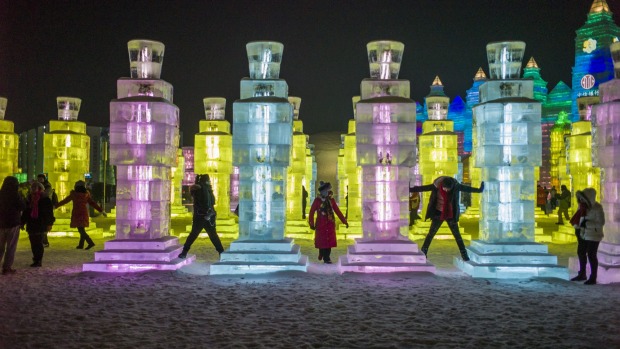people visiting the China Ice and Snow World on the eve of the opening ceremony of the Harbin International Ice and Snow ...