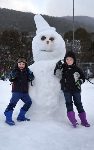 Building a snowman is a rite of passage.