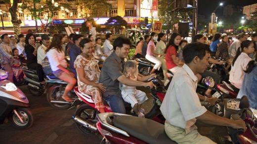 Not for the faint-hearted: Scooters at night, Ho Chi Minh City, Vietnam.
