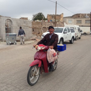 A local on a motorbike.