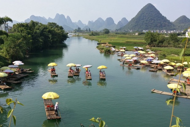 View from the 600-year-old stone Dragon Bridge that crosses the Yulong River, a little south of Yangshuo.