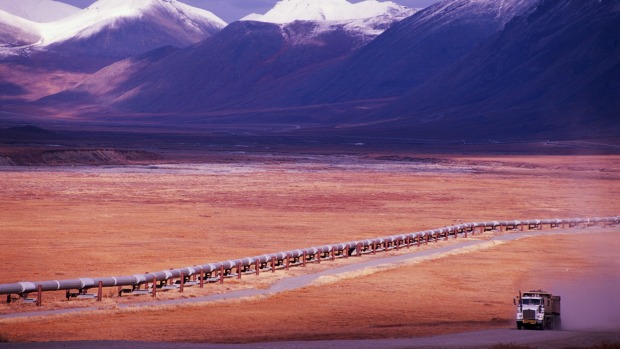 Long haul: A truck travels along the highway beside the Trans-Alaska Pipeline.