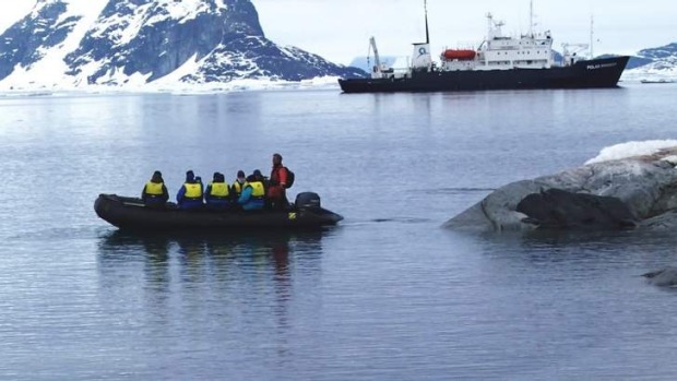 Raw beauty: a Zodiac with the Polar Pioneer in the background.