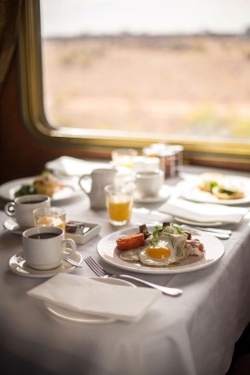 Breakfast is served in the Queen Adelaide restaurant dining carriage on the Indian Pacific train between Sydney and Perth.