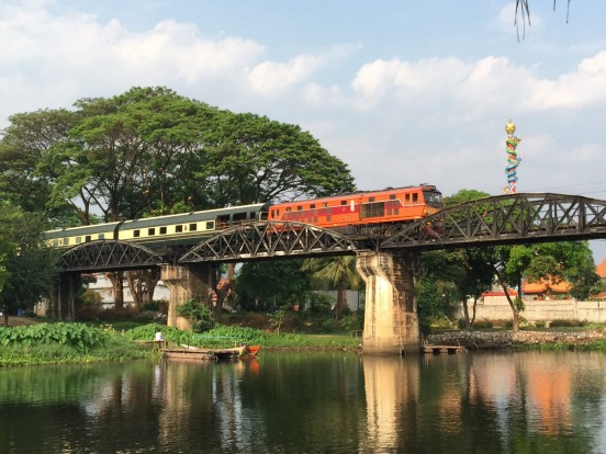 The Eastern & Oriental Express passing over the Bridge on the River Kwai.