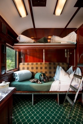 Throughout the train, the suites are fitted out in Rhodesian teak and pine, and the decorations are all very classy, ...