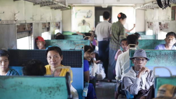The interior of the Yangon train is hardly luxurious.