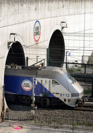 THE LONGEST UNDERSEA TUNNEL IN THE WORLD: A train emerges from the Eurotunnel in Coquelles, northern France. Since the ...