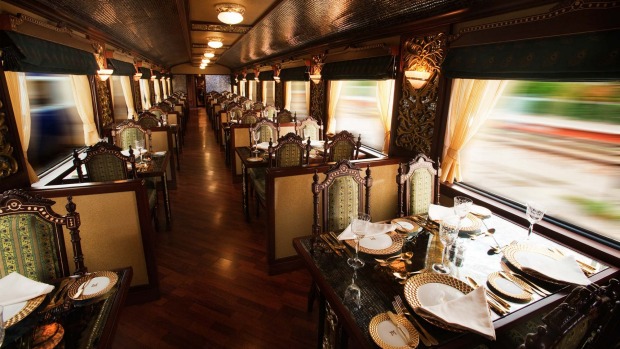 THE MOST EXPENSIVE TRAIN JOURNEY IN THE WORLD: The Peacock Restaurant on board the Maharajas' Express.