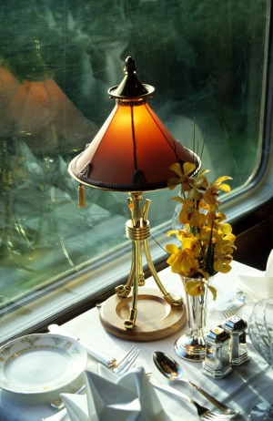 Lamp and table setting in dining car of the Eastern and Oriental Express Train.