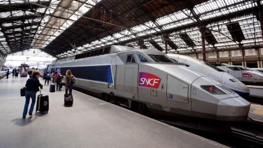 Gourmet delights: Passengers and a TGV high-speed train, at the Gare de Lyon, in Paris.