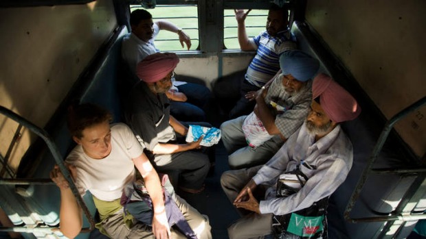 All aboard: a European among the locals on a train.