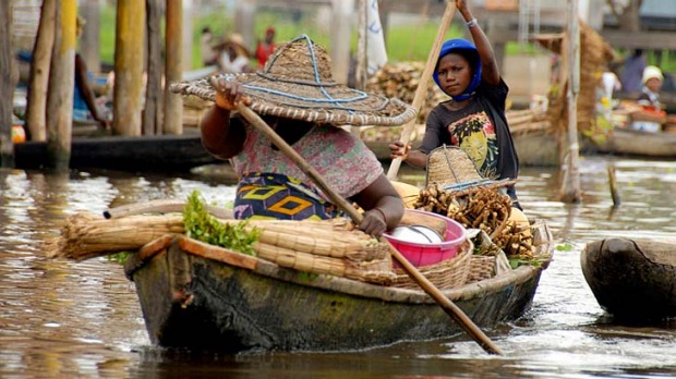 Casting a spell ... villagers on the lake at Ganvie.