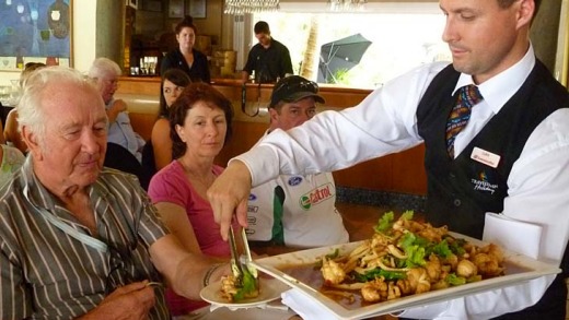 During a beachside cooking lesson, guests are treated to freshly cooked dishes using Queensland produce.