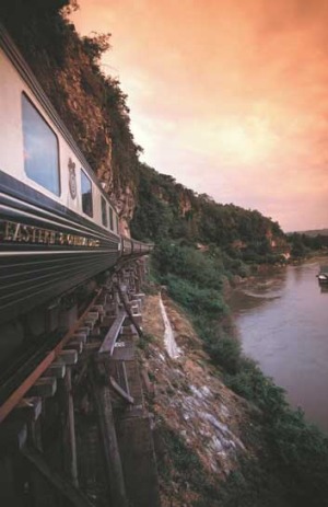 The train crossing Kanchanaburi Bridge.