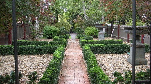 English-style gardens set off the house.
