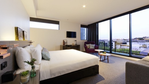 A room with a sweeping view in the Alpha Mosaic Hotel.