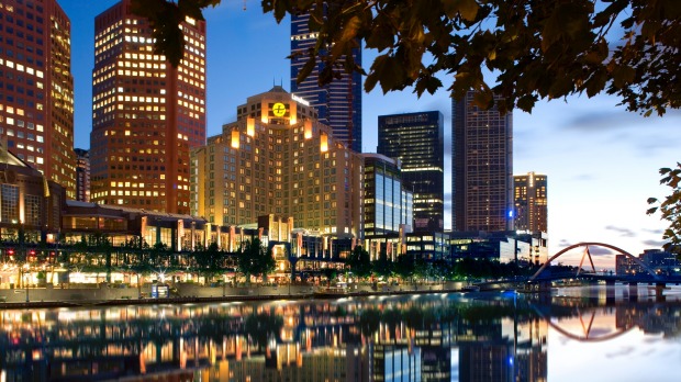 The exterior of The Langham at night.