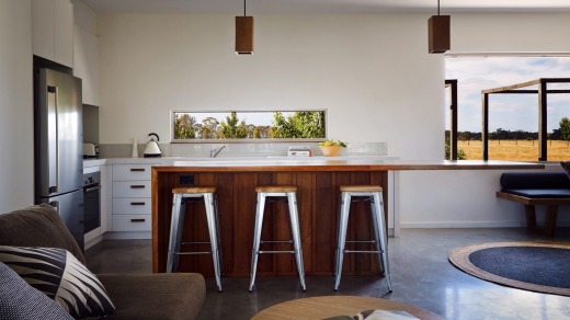 The open-plan kitchen encourages guests to make cooking part of the experience.