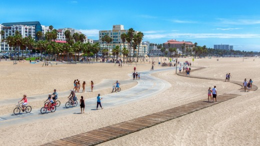 Bicycle path snakes across Santa Monica beachfront.