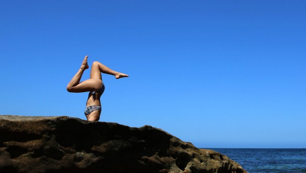 Many people are now going to exotic places to do yoga, rather than to drink beer.
