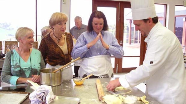 Budding cooks ... students take tips from the winery and retreat's chef.