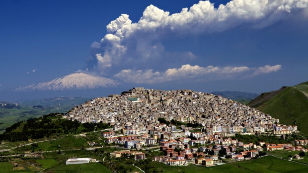 Hot picks: Gangi, Sicily, with Mount Etna erupting in the background.