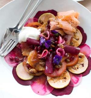 Mandala-like red salad of guavas, beetroot, pomegranate and other garden produce.