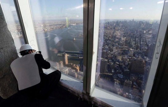 New York Port Authority officials unveil the stunning view from the top of One World Trade Centre, a 360-degree eagle’s ...