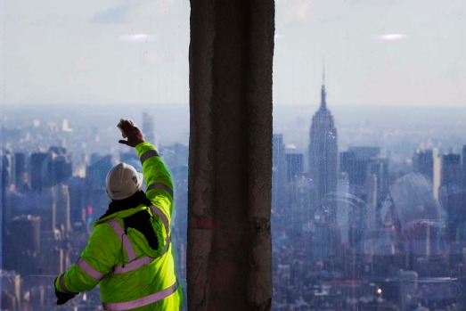 New York Port Authority officials unveil the stunning view from the top of One World Trade Centre, a 360-degree eagle’s ...