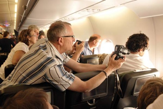 Punters at midnight aboard the NYE 09 airbus A380, the first time one has flown to Antarctica.