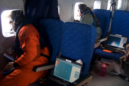 Not your average passengers. Whale researchers over Anntarctica.