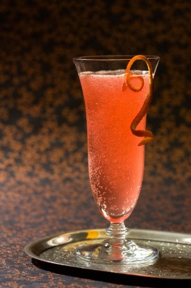 French 75: When in France head for this delicate mix of gin, lemon juice or blood orange, and sugar syrup topped with ...