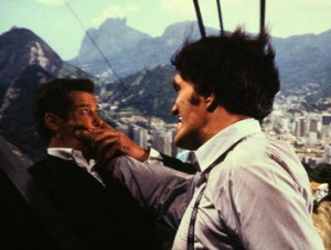 Roger Moore, as Bond, does battle with Jaws in Rio de Janeiro.