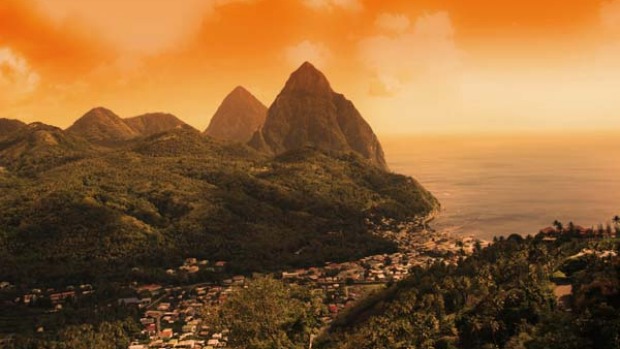 The bright side ... sunset over St Lucia's Pitons.