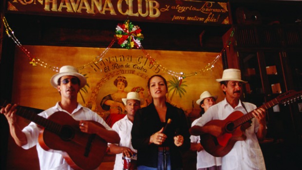 Cuban collective ... musicians perform in the Bar Havana Club.